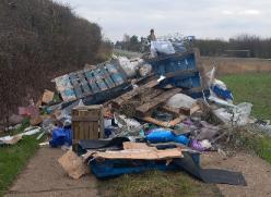 Large mound of rubbish from a skip