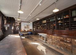 interior of Adams Heritage Centre showing Victorian wooden shelving
