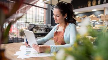 Lady sat at a table working