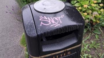 bin with 'snot' graffiti on