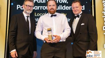 Photo left to right: Hugh Dennis (compère), Paul Barrow and Jon Vanstone – Chair of the BSR Industry Competence Committee (one of the judges)