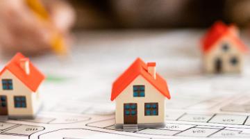 Decorative image, houses on top of a map 